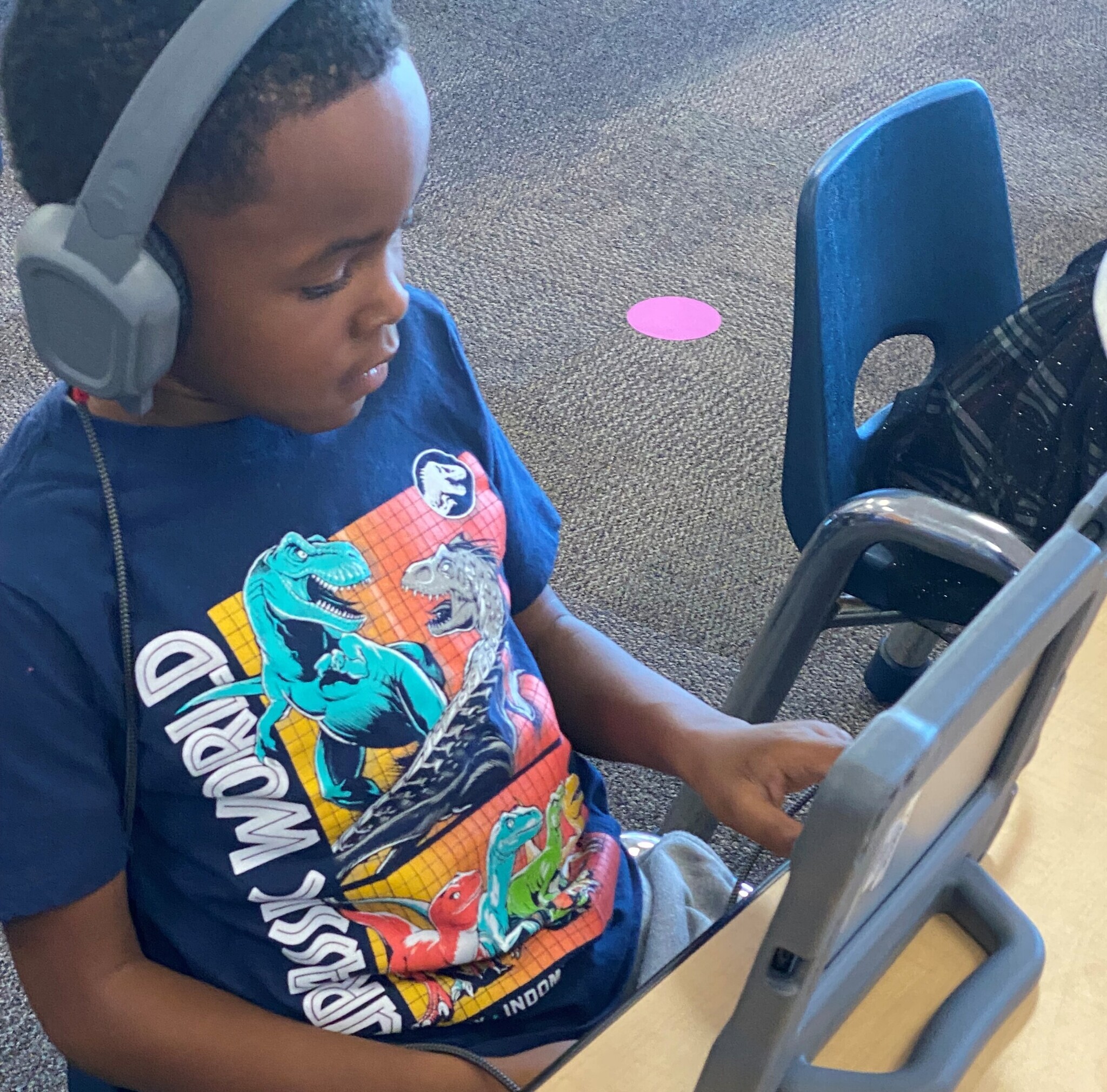 ycs student on his iPad